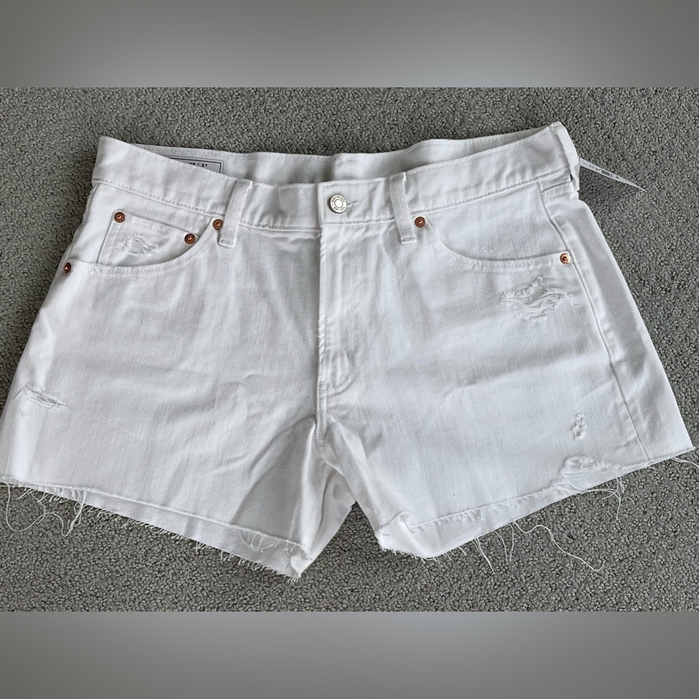 White jean shorts. New with tags. Size 8.